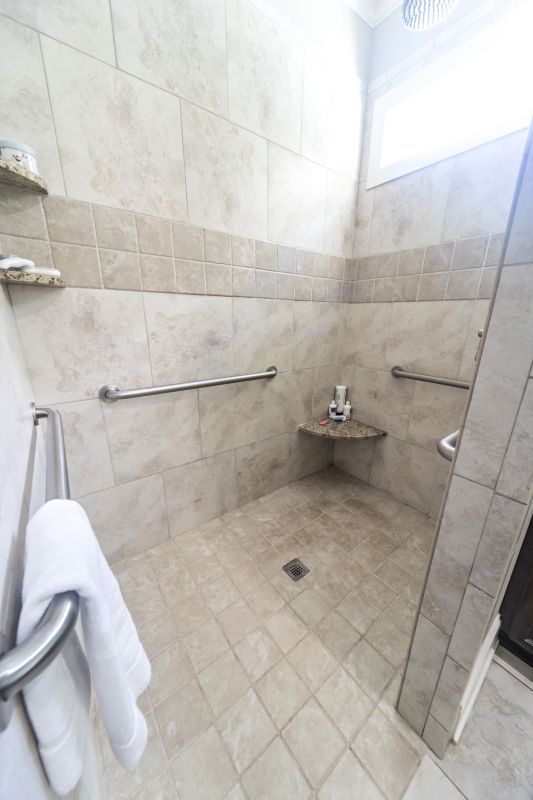 Walk-in Shower Featuring Built-in Seating